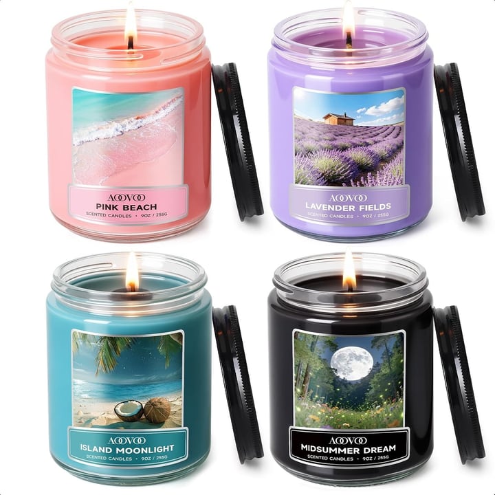 Four scented soy candles in coloured glass jars